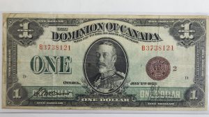 Canada $1 1923 McCavour-Saunders Bronze Seal Group 2 - VF35
